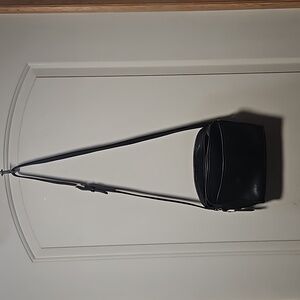 Vintage black cross body Coach bag.